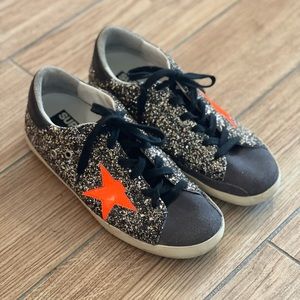 Golden Goose black and gold glitter sneaker with orange star size 39